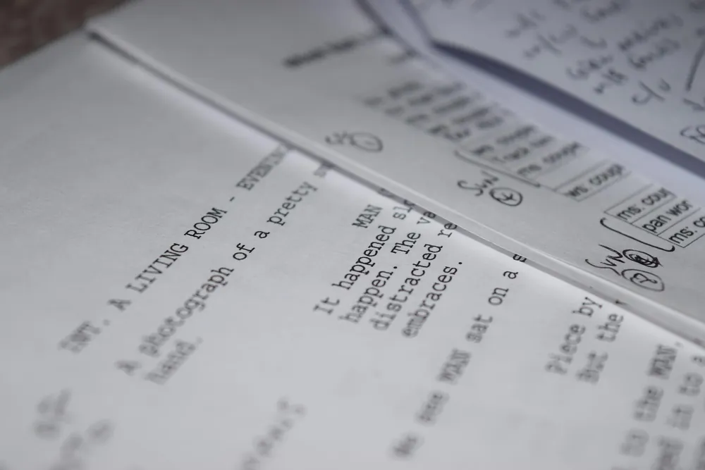 Screenplay pages with handwritten notes in the margins